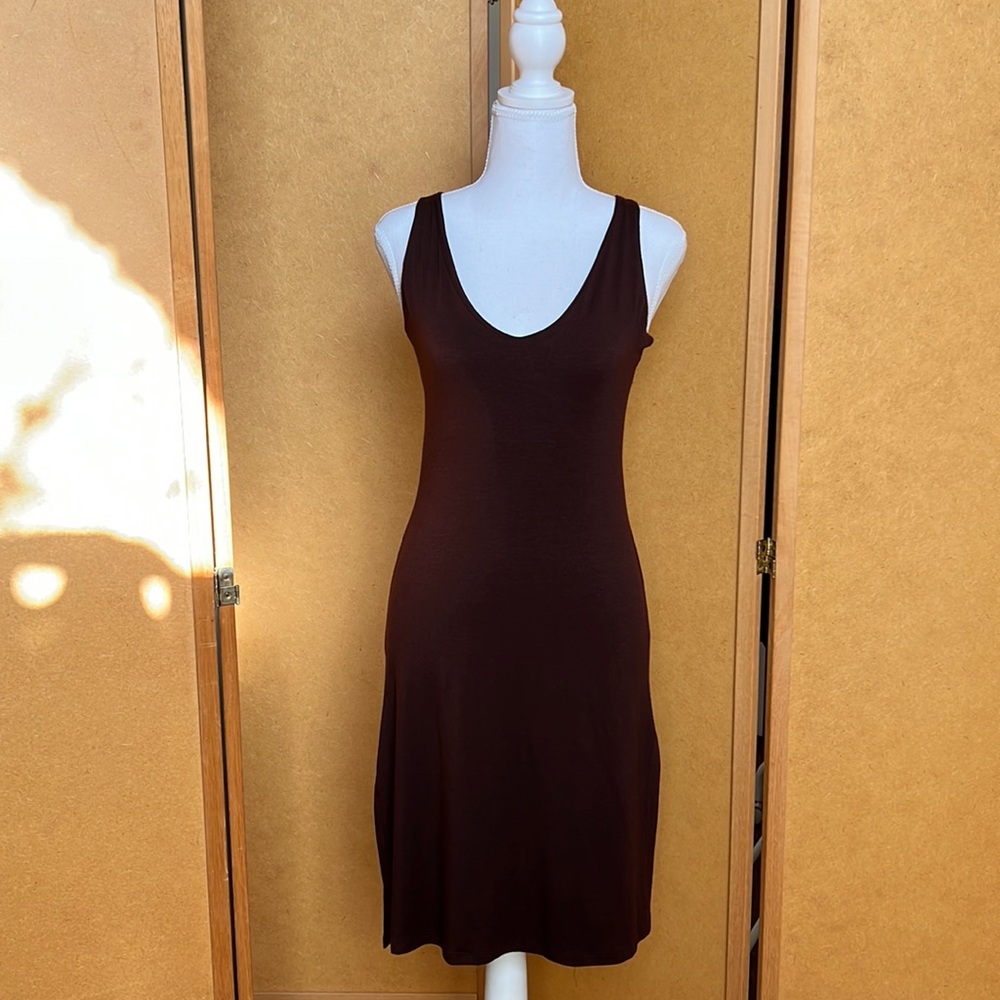 Brown soft, stretchy dress w/ side slits. Size L but clingy on small and medium.